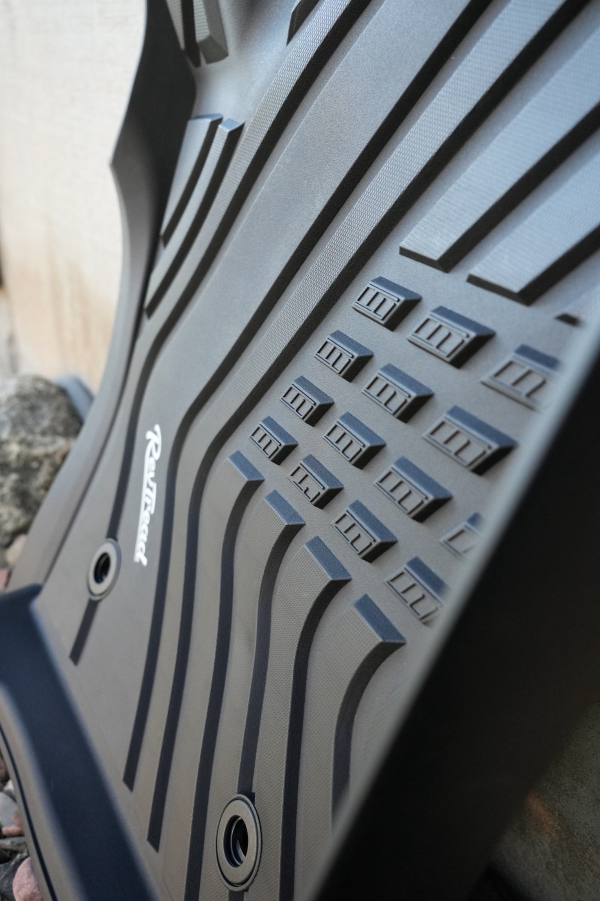 Close-up of the raised tread blocks on a RevTread floor mat
